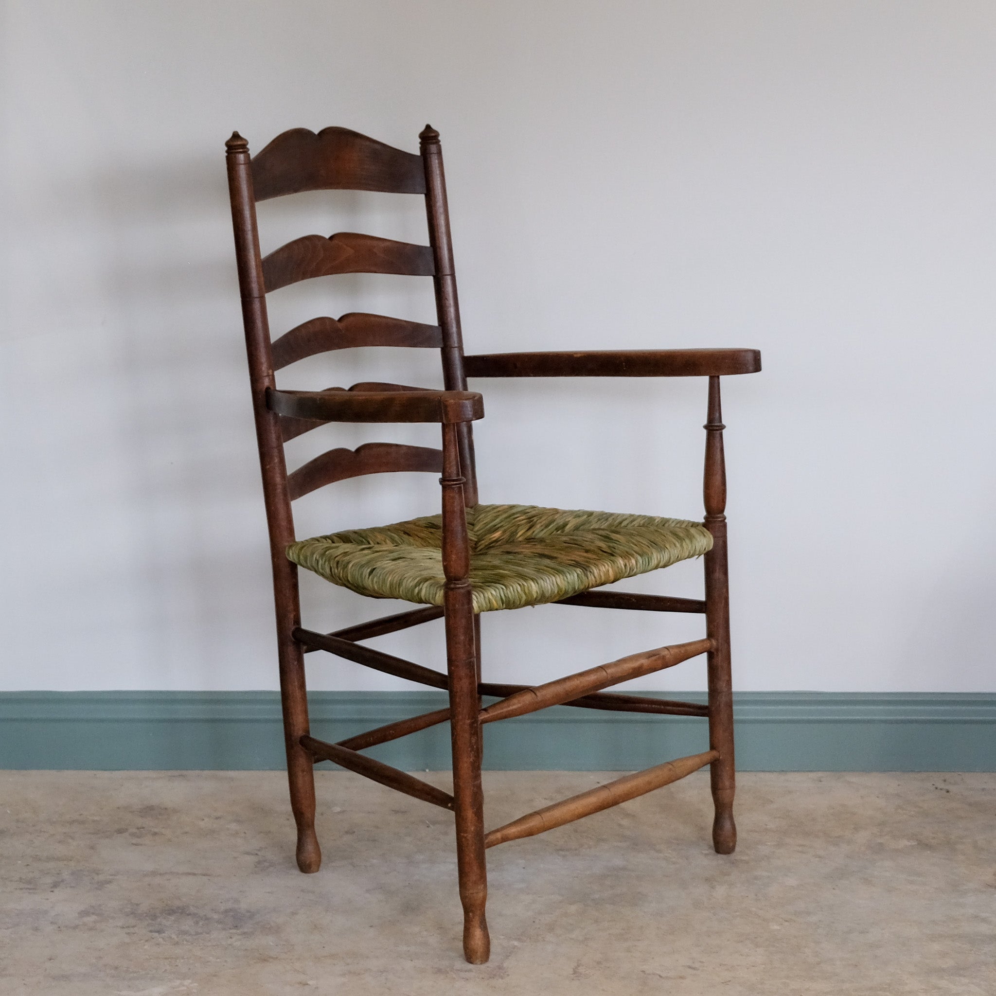 19th century ladder back carver armchair