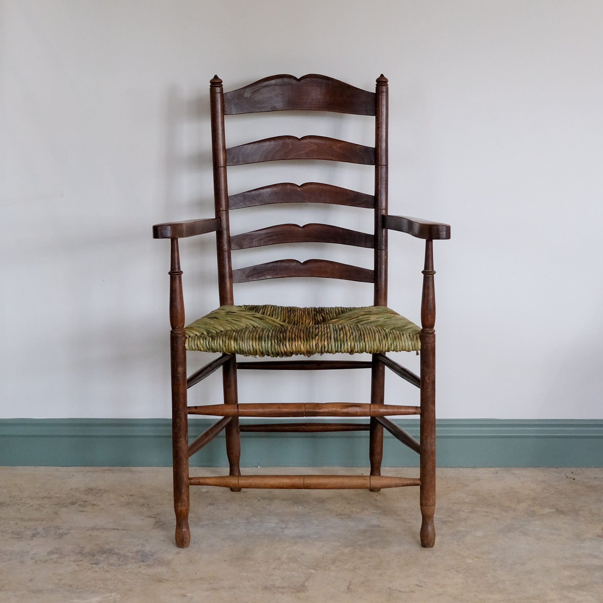 19th century ladder back carver armchair