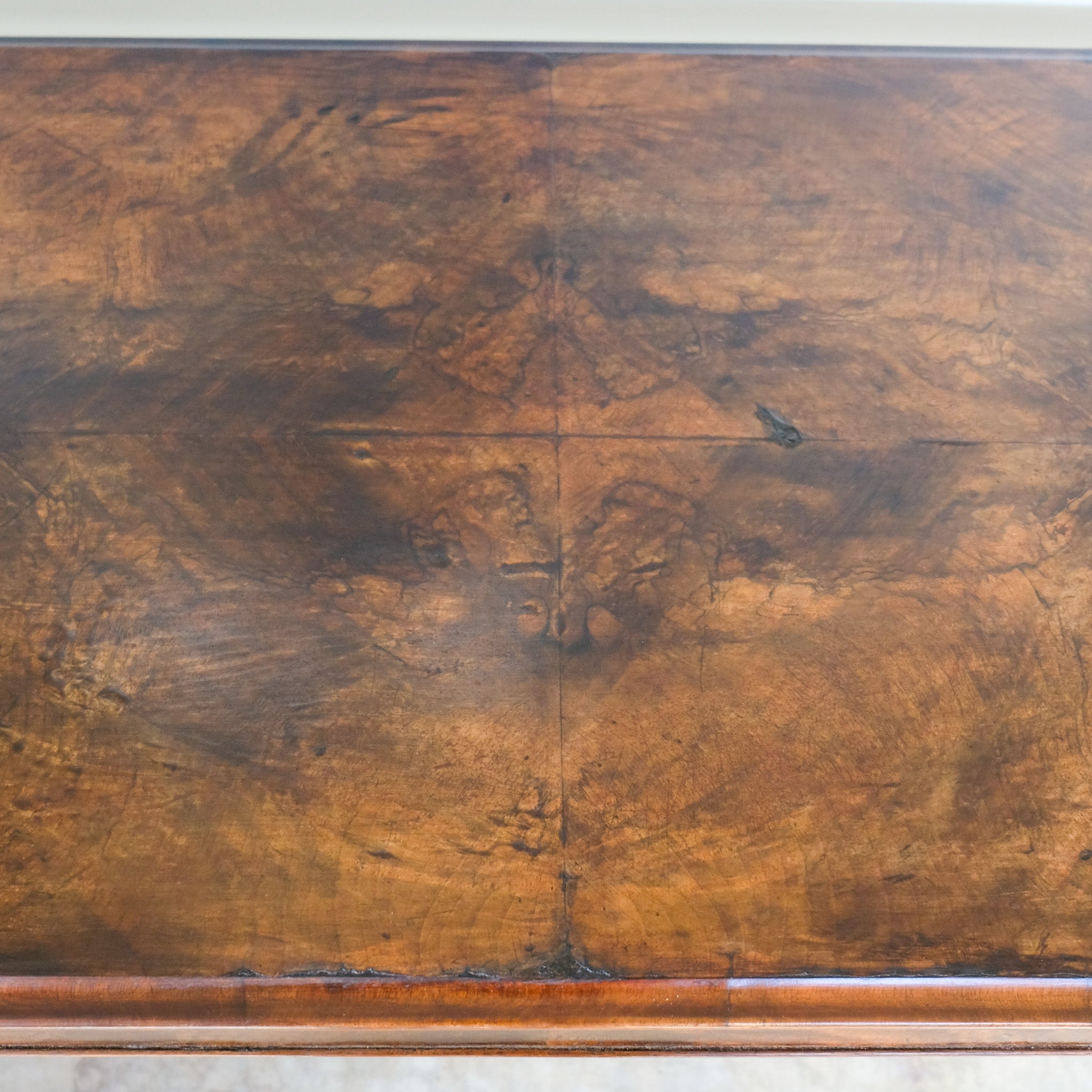 A VICTORIAN WALNUT AND ROSEWOOD LIBRARY TABLE
