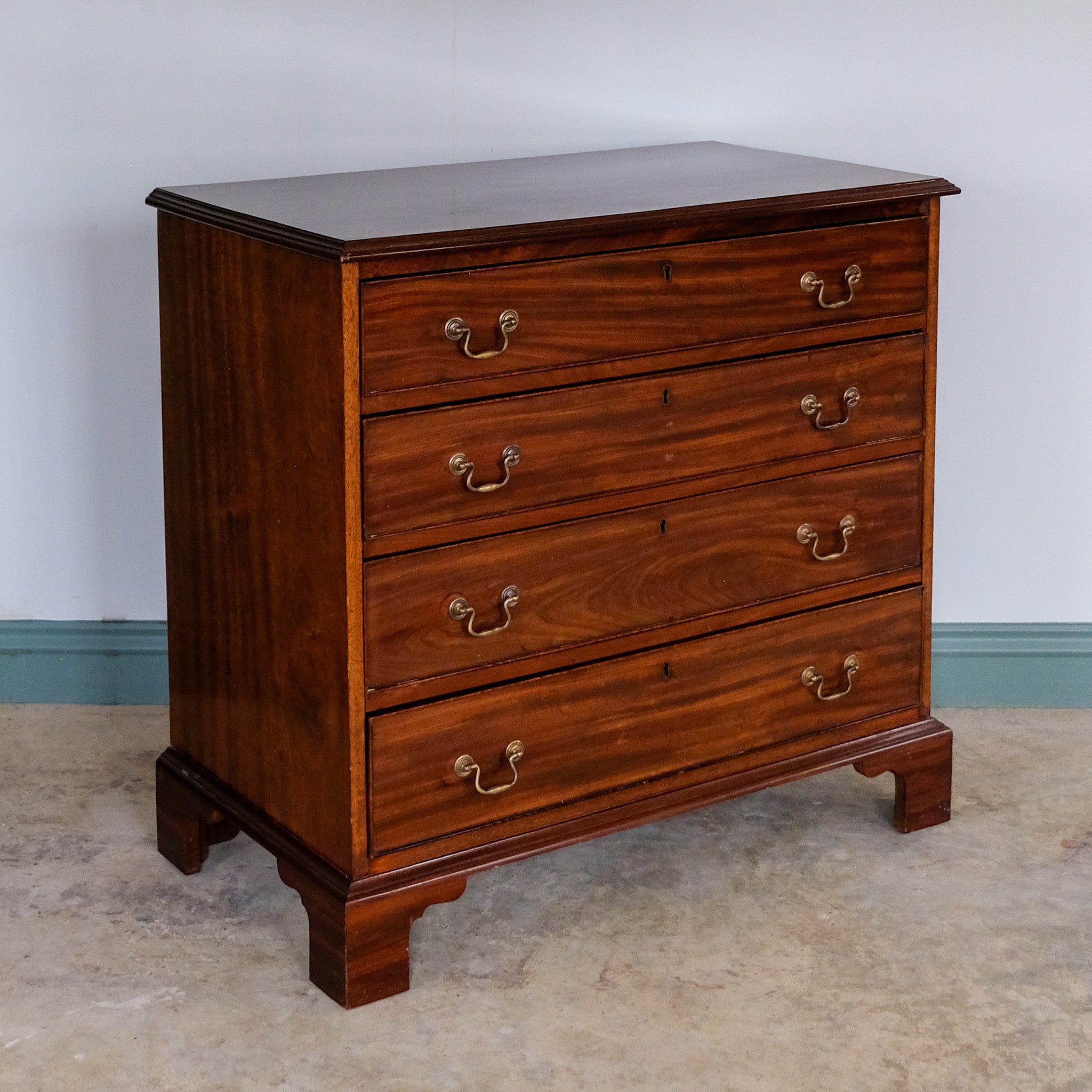 SMALL MAHOGANY CHEST OF DRAWERS