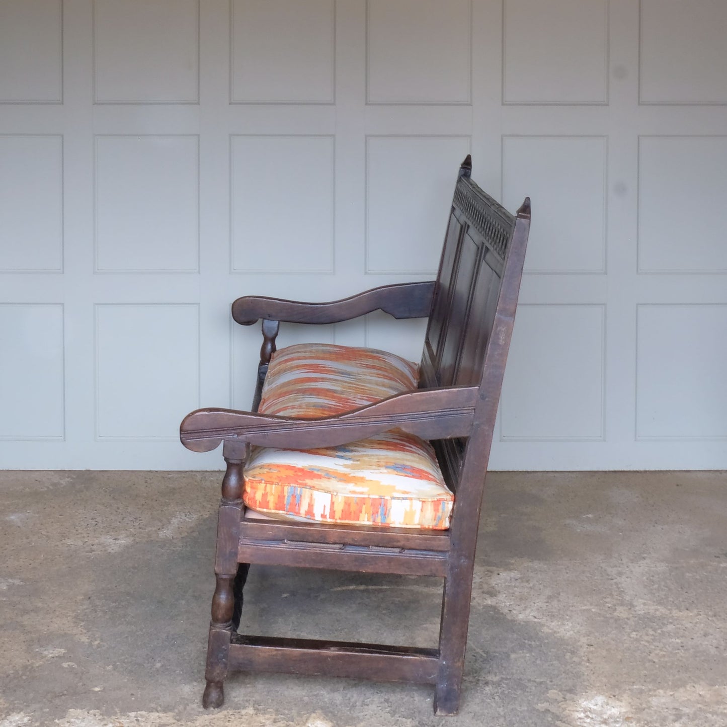 Side view of Vintage 18th Century Oak Settle with Upholstered Cushion - Summerfield & Scott