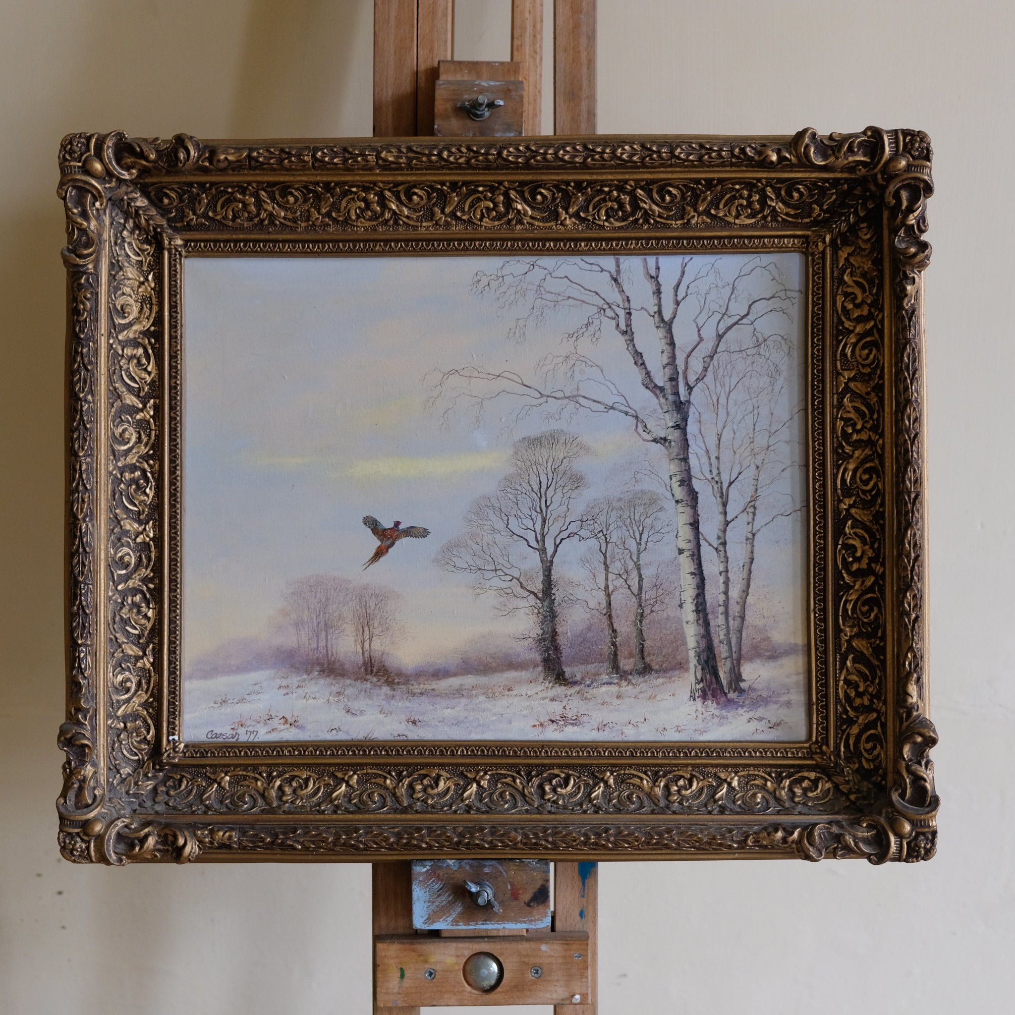 WINTER LANDSCAPE WITH A PHEASANT IN FLIGHT