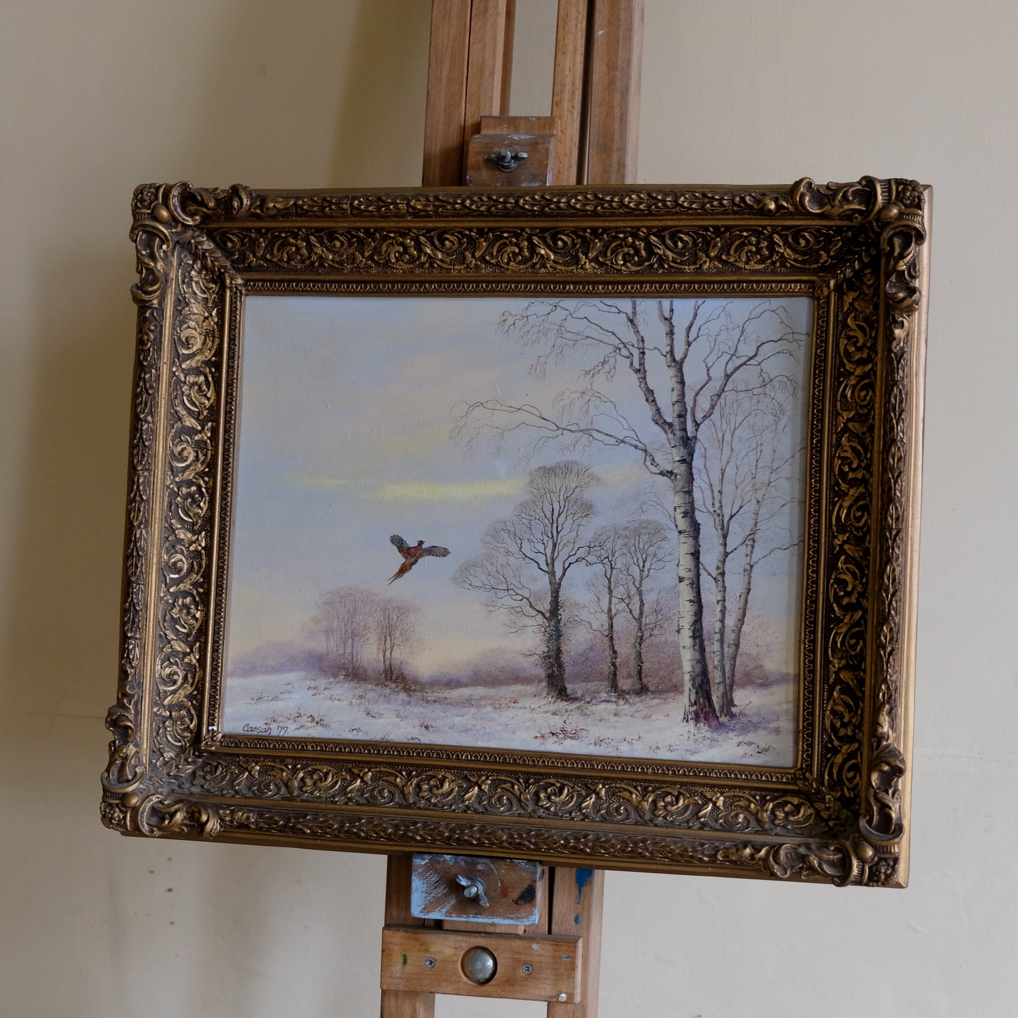 WINTER LANDSCAPE WITH A PHEASANT IN FLIGHT