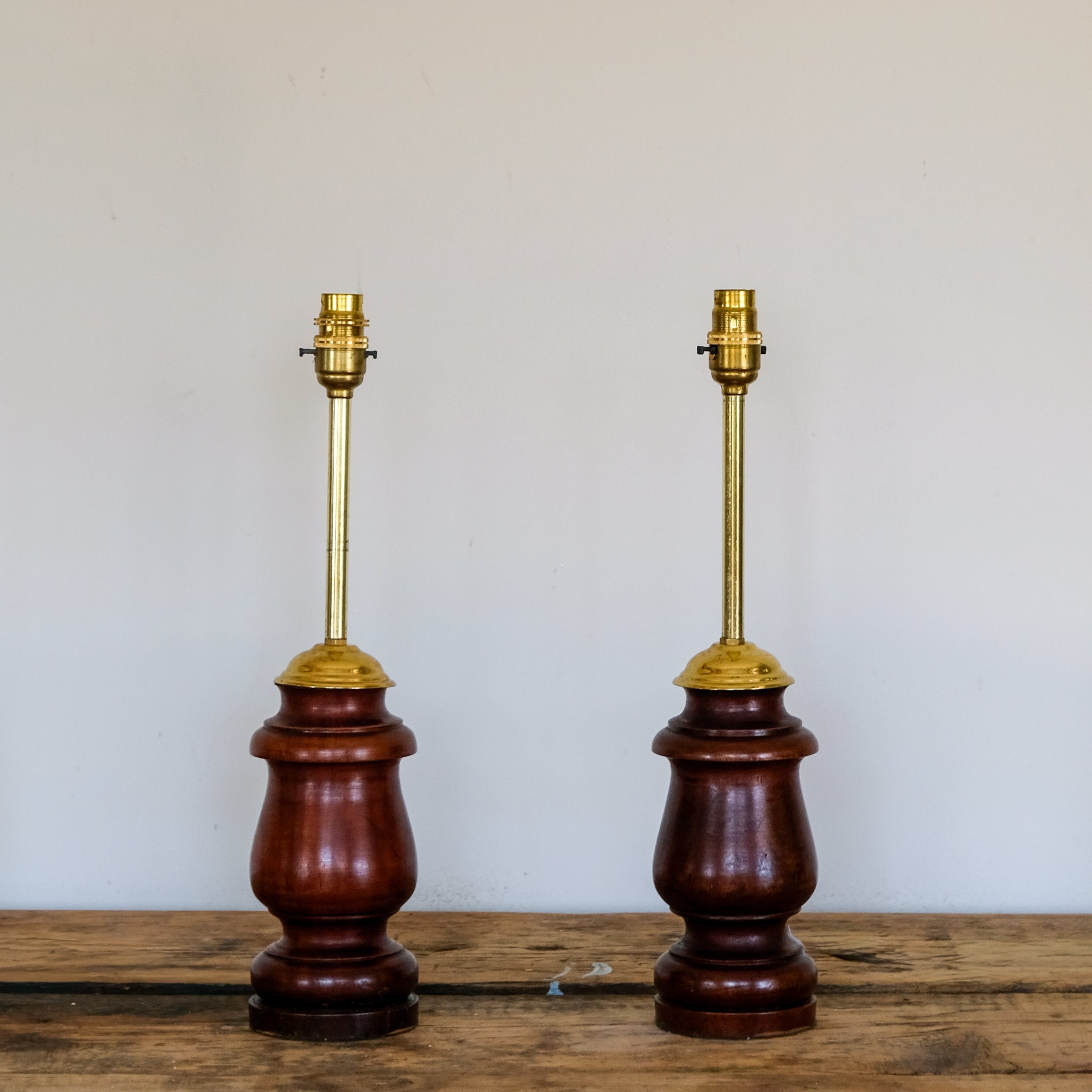 PAIR OF FIGURED HARDWOOD TABLE LAMPS