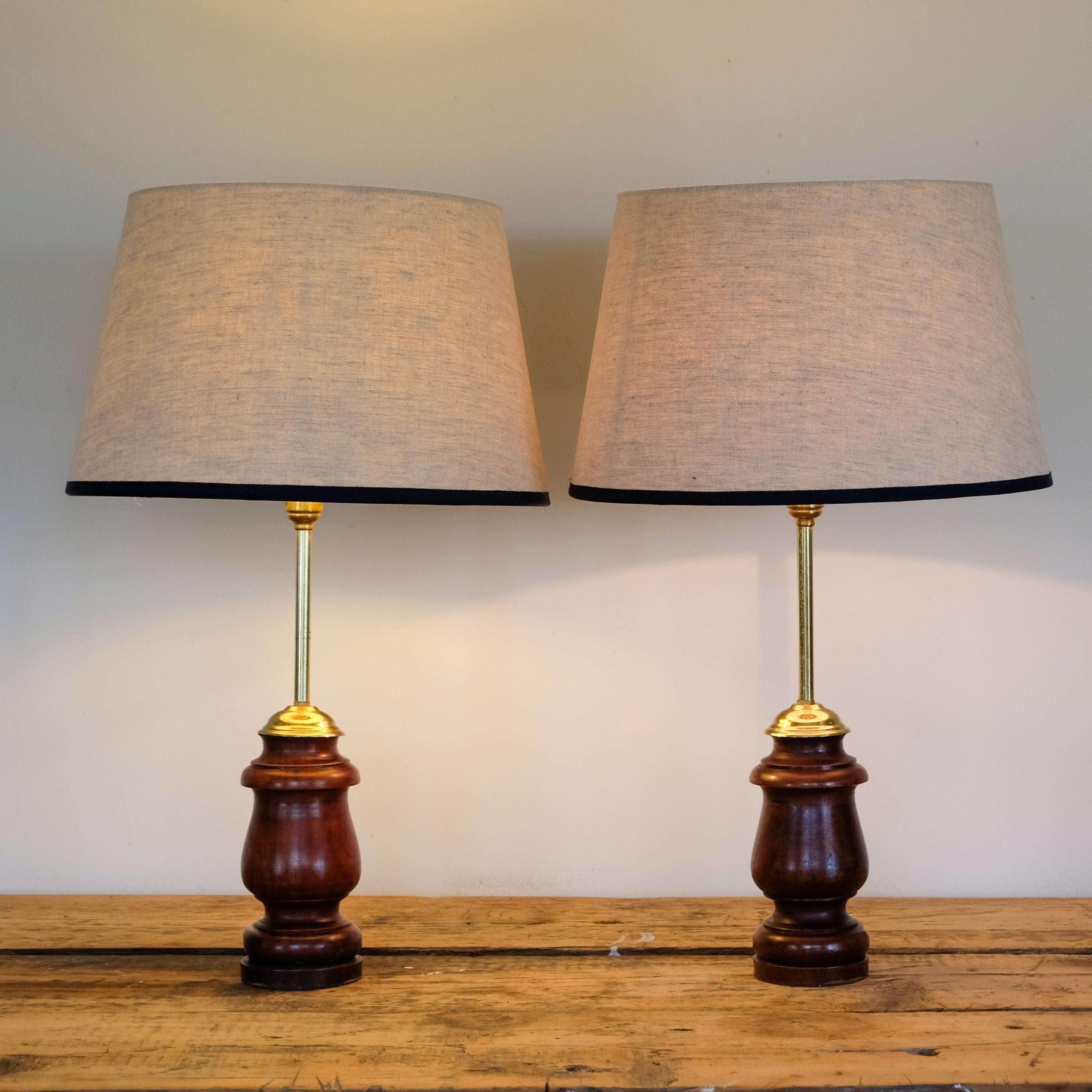 PAIR OF FIGURED HARDWOOD TABLE LAMPS