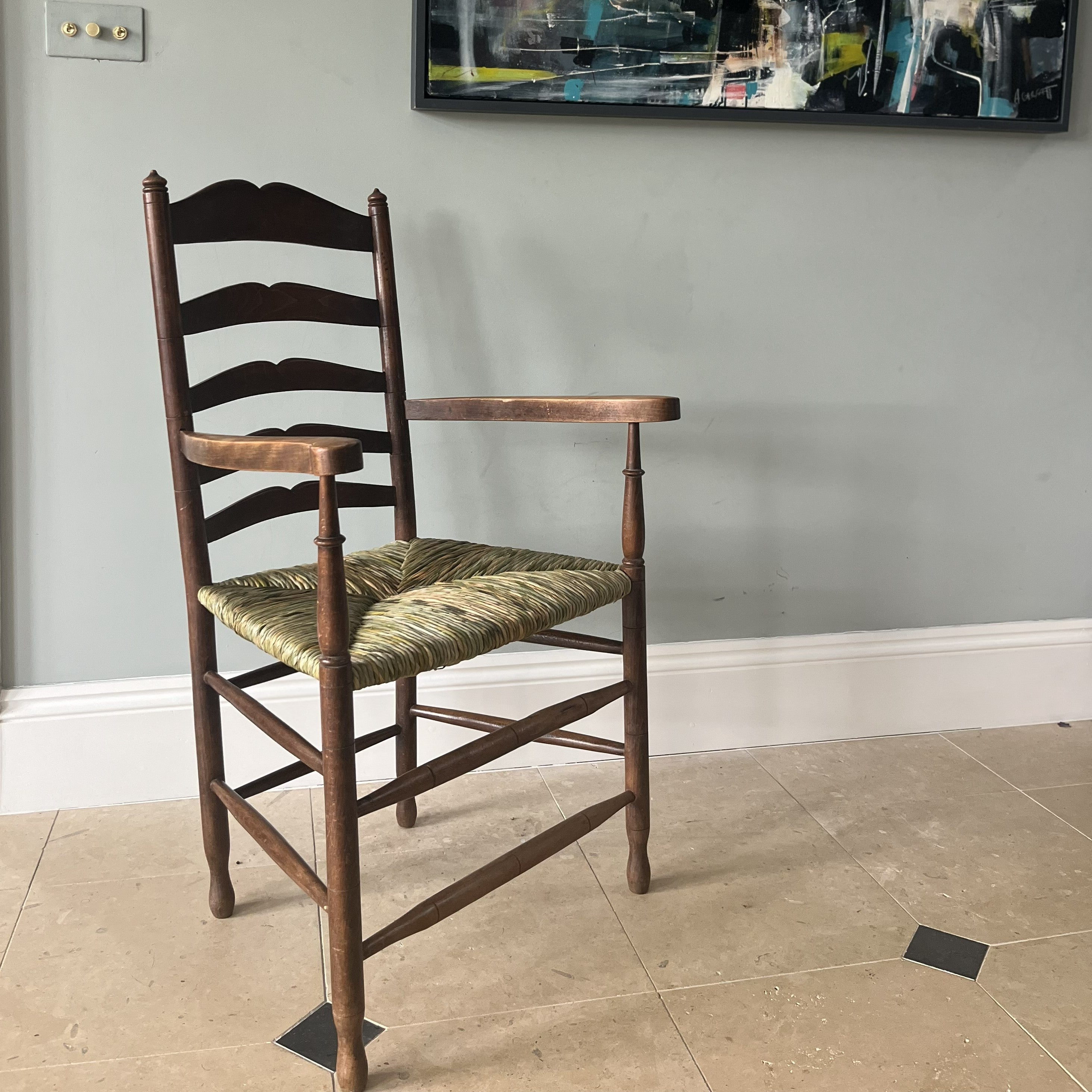 19th century ladder back carver armchair