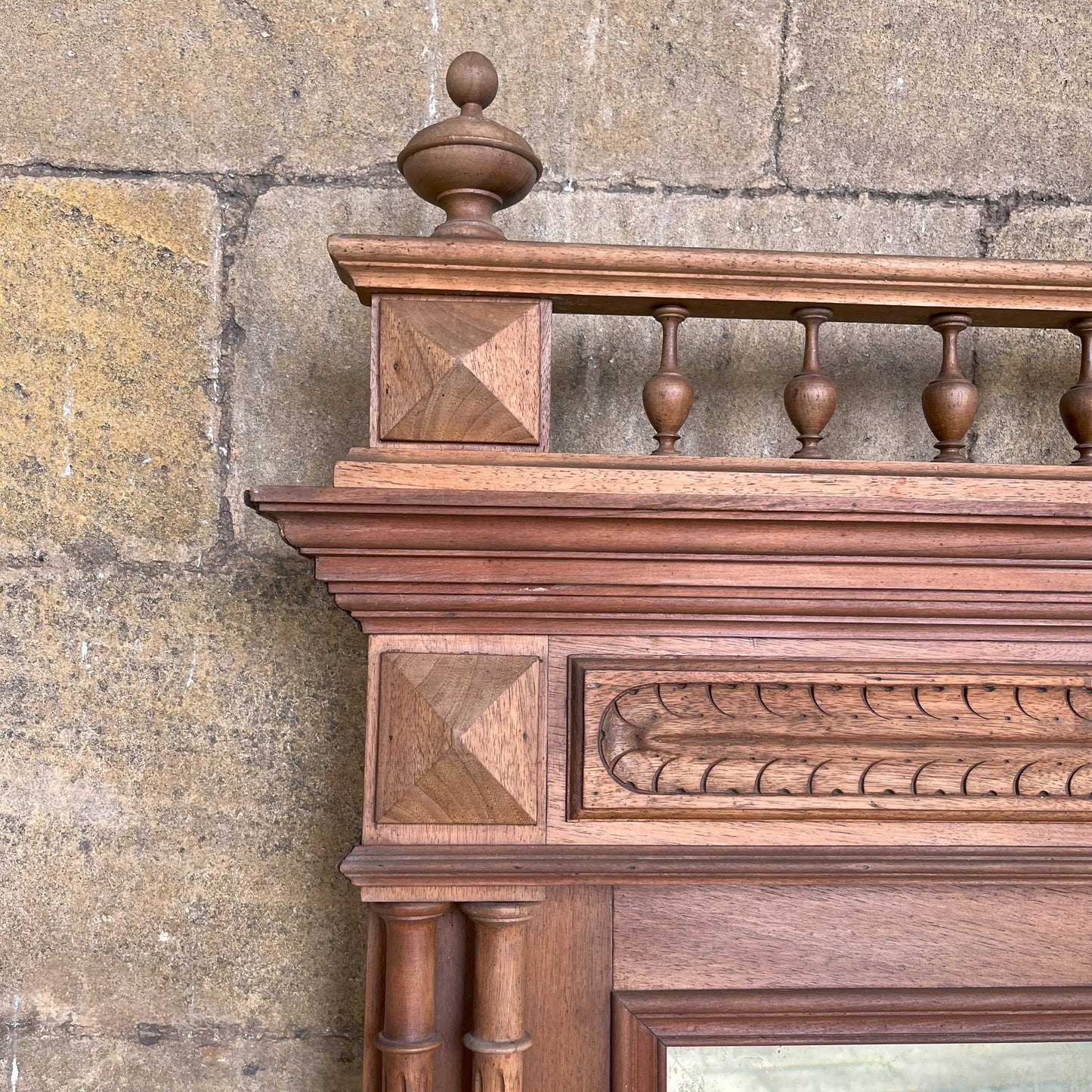 A 19th century pier mirror with original mercury plate in very good condition, some foxing giving a pleasing patina. Flanked on either side by two fluted columns, with detailed carving above.
