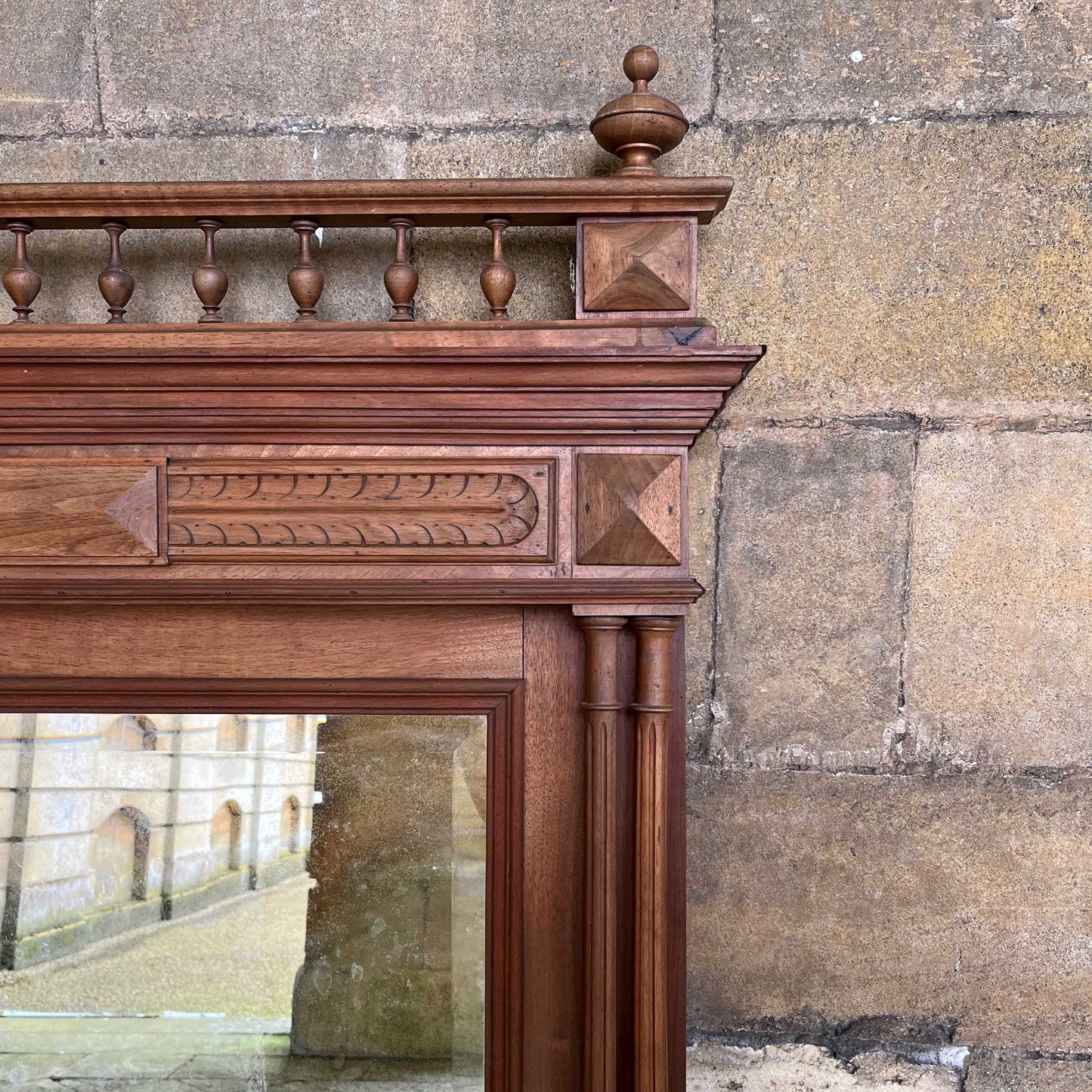 A 19th century pier mirror with original mercury plate in very good condition, some foxing giving a pleasing patina. Flanked on either side by two fluted columns, with detailed carving above.