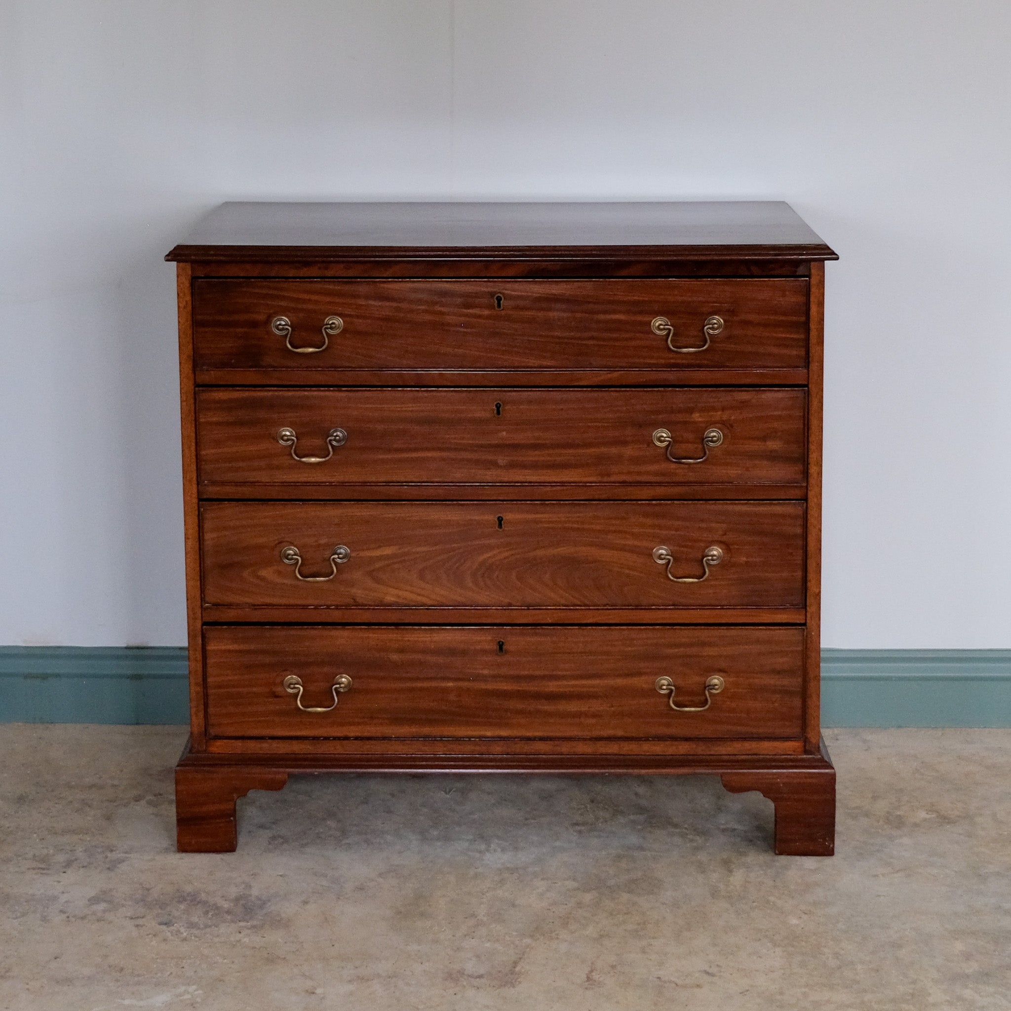 SMALL MAHOGANY CHEST OF DRAWERS