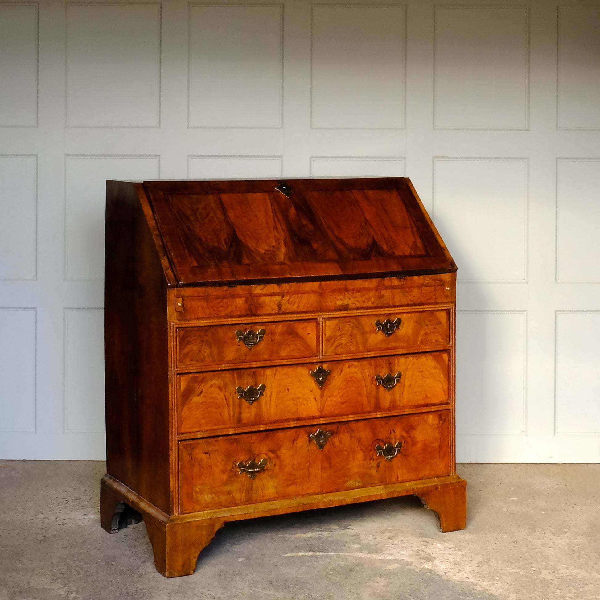 Side angle view of Antique George I Walnut Bureau with Drawers - by Summerfield & Scott