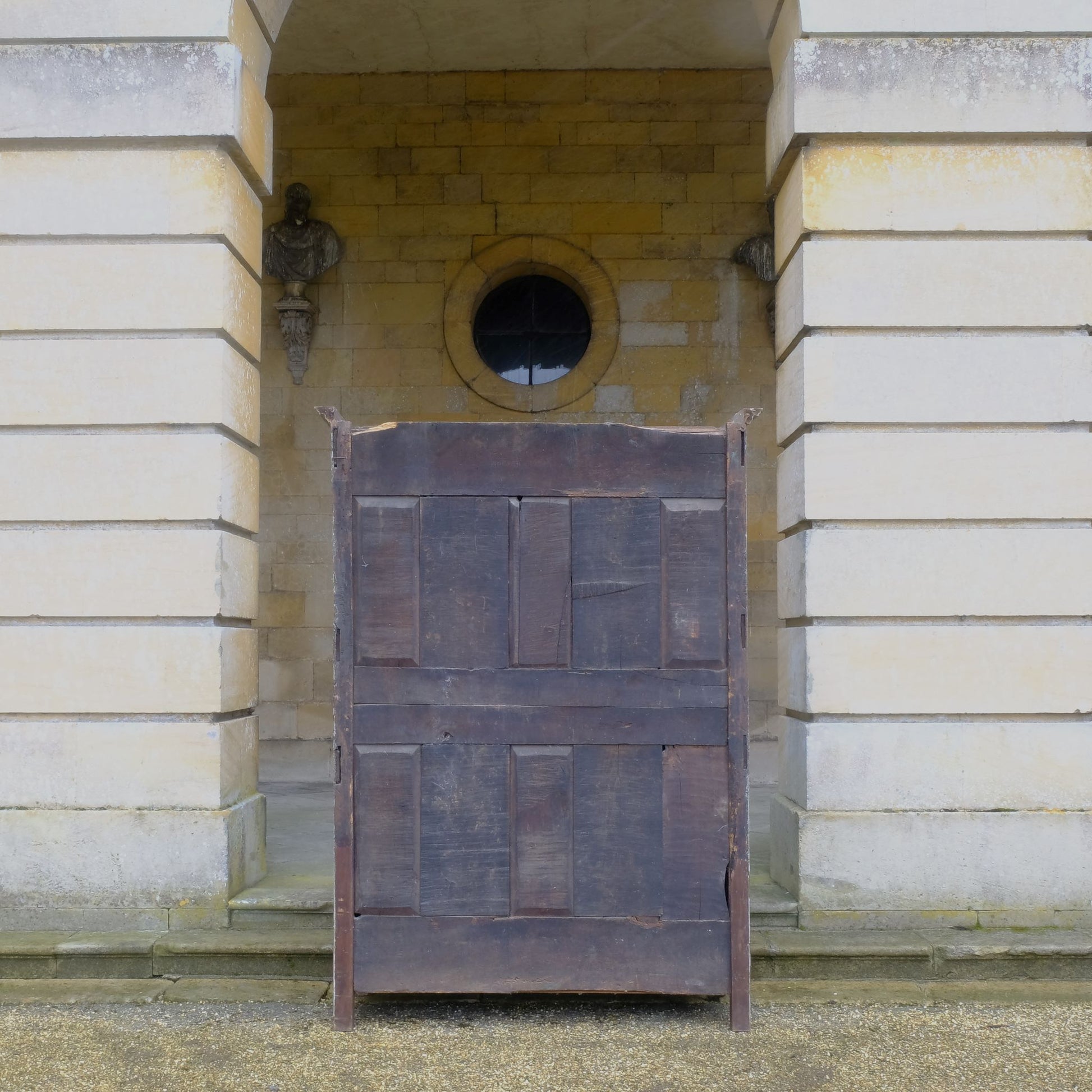 A large 19th century French light blue/green painted cupboard. A moulded cornice above panelled doors with decorative iron hinges and single escutcheon with key. A beautiful colour combination, with a charming crackled patina throughout. Fitted with new slatted shelving to the interior, would make great use as pantry or housekeeper's cupboard.