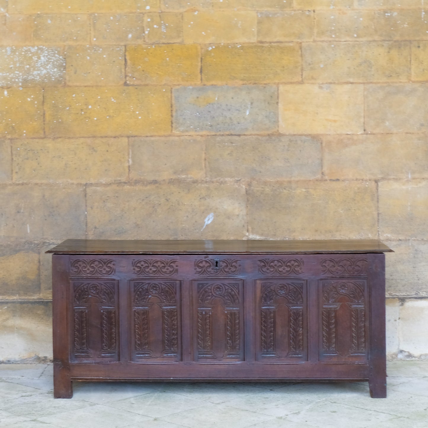 A large 17th century oak coffer with a beautiful five panelled front 
