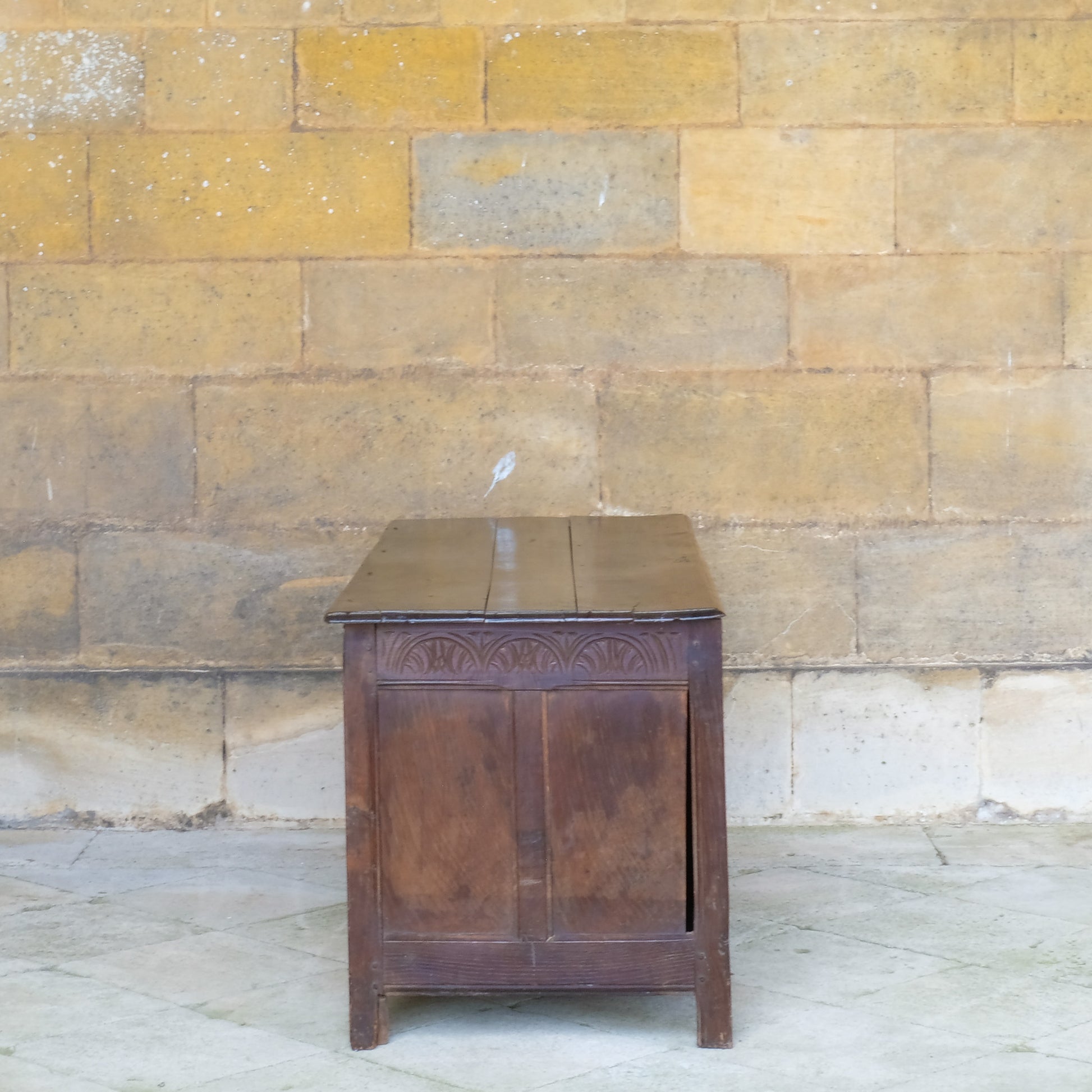 A large 17th century oak coffer with a beautiful five panelled front 