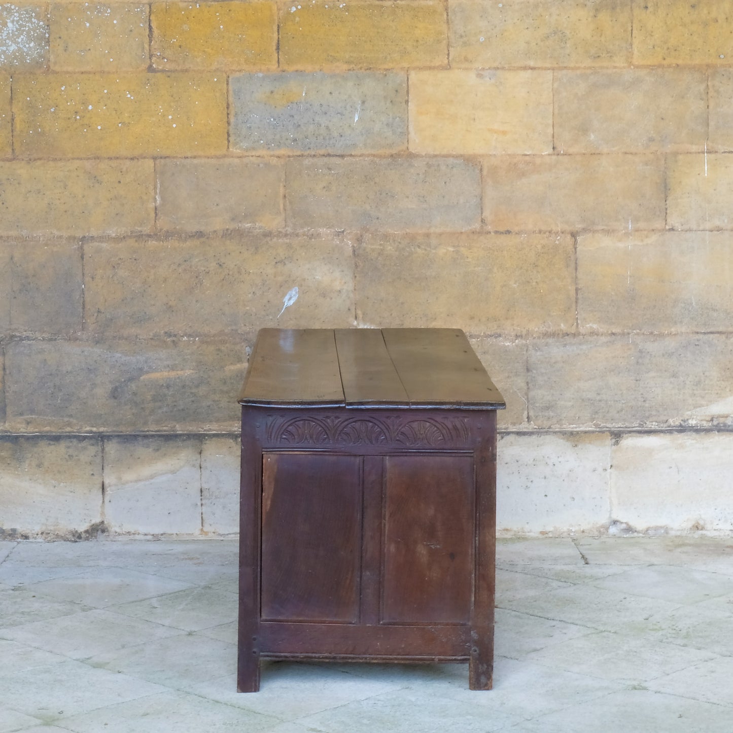 A large 17th century oak coffer with a beautiful five panelled front 