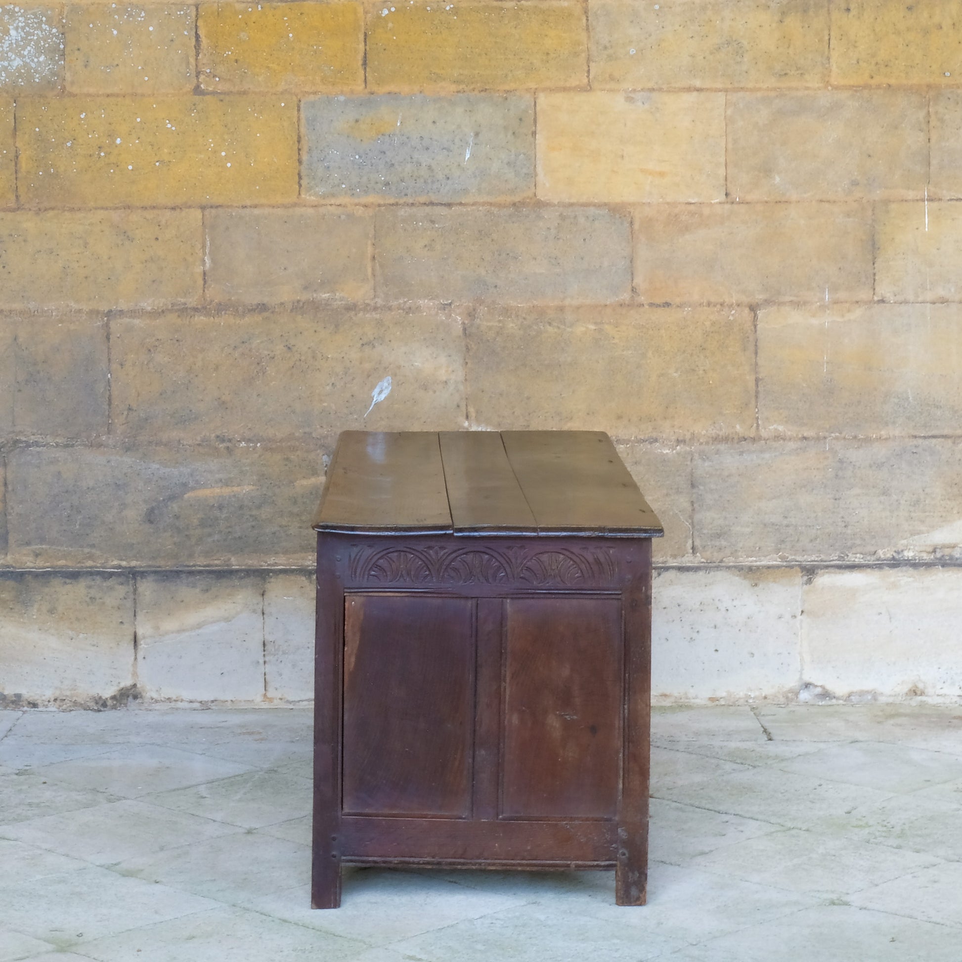 A large 17th century oak coffer with a beautiful five panelled front 