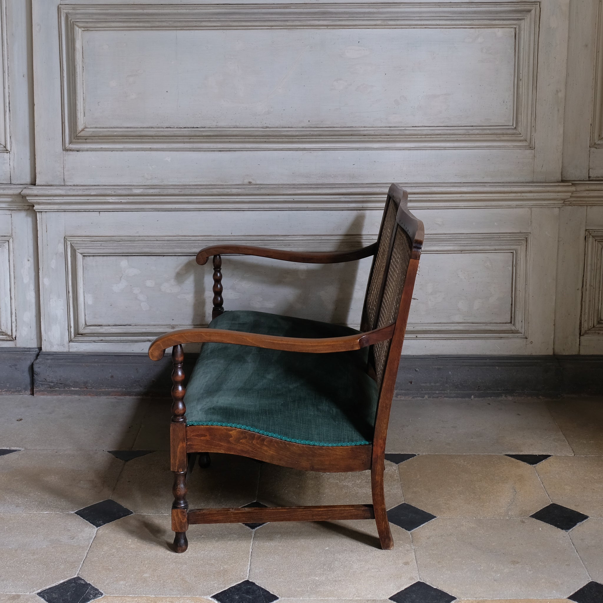 Side view of vintage 17th Century Caned Backed Settee with Velvet Seat Pad - Summerfield & Scott