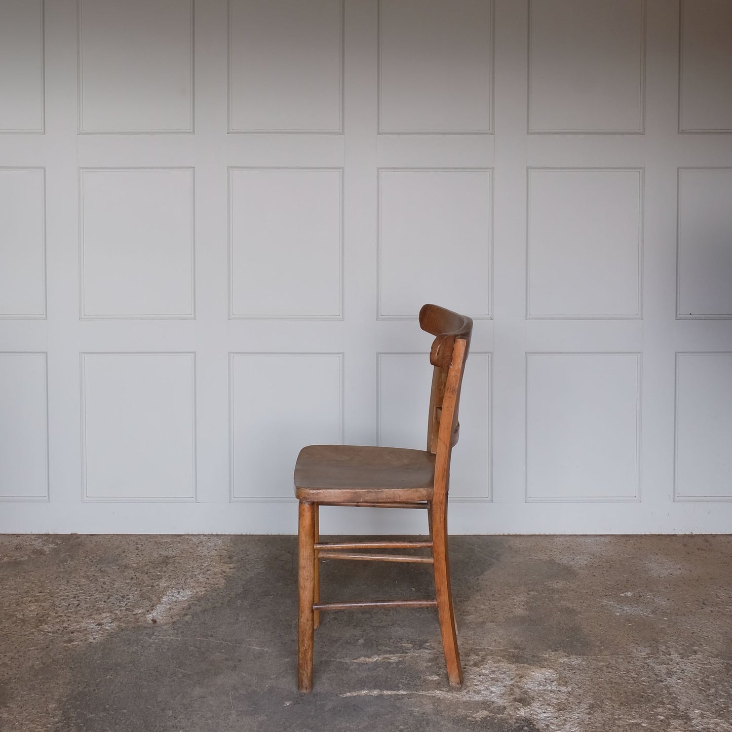 A classic school chair design, of adult size, made from hard-wearing and durable solid wood. With signs of life, cleaned and waxed, in good, sturdy condition.