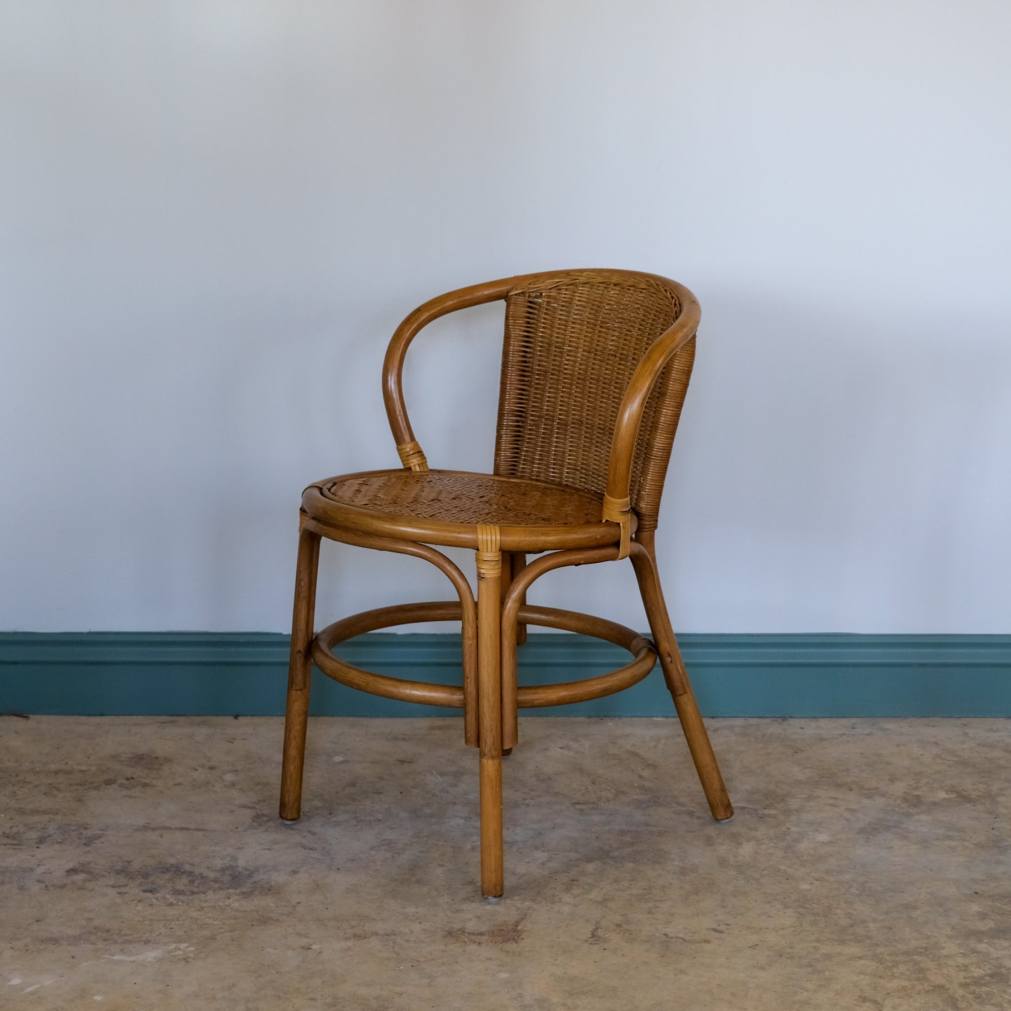 SMALL RATTAN BENTWOOD ARMCHAIR