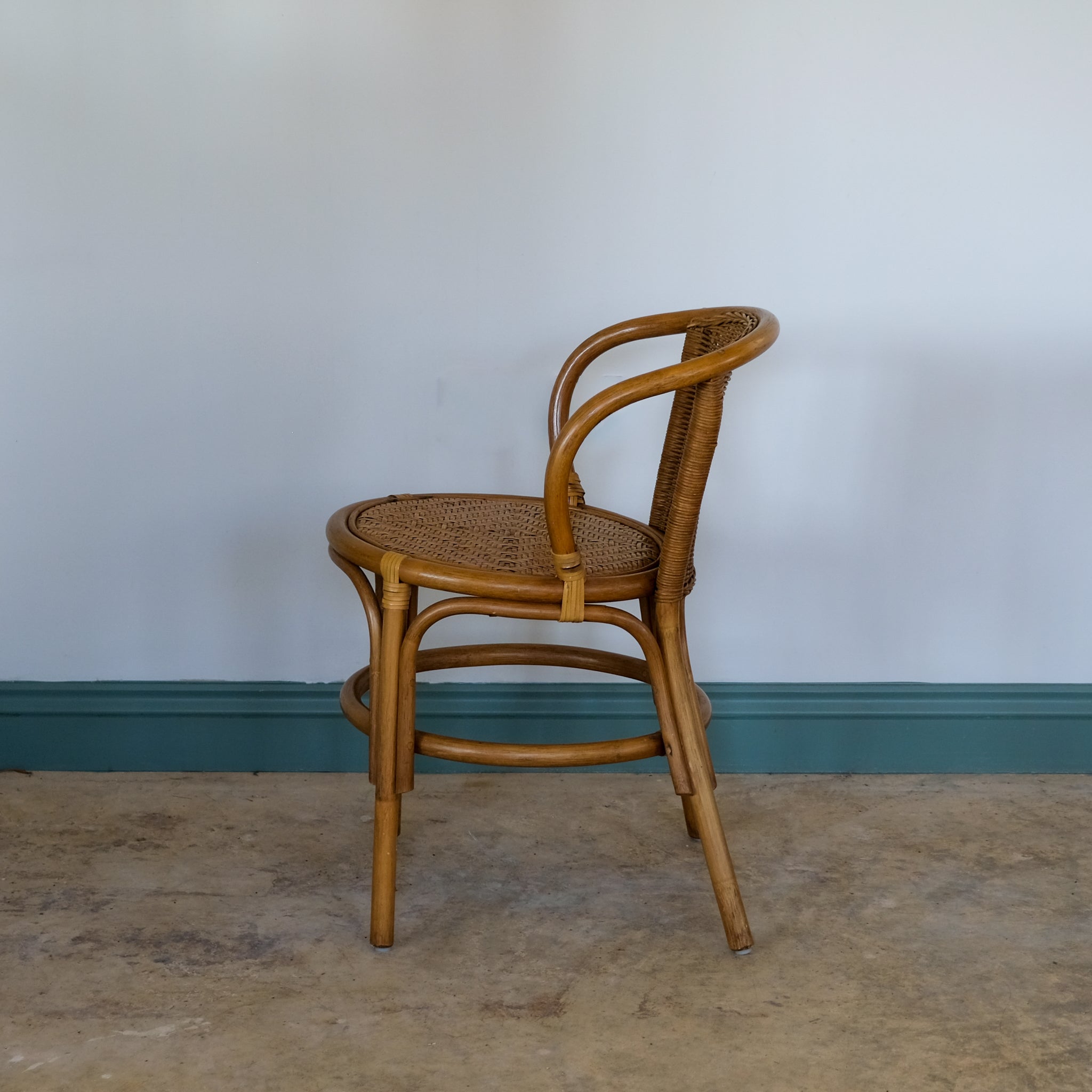 SMALL RATTAN BENTWOOD ARMCHAIR