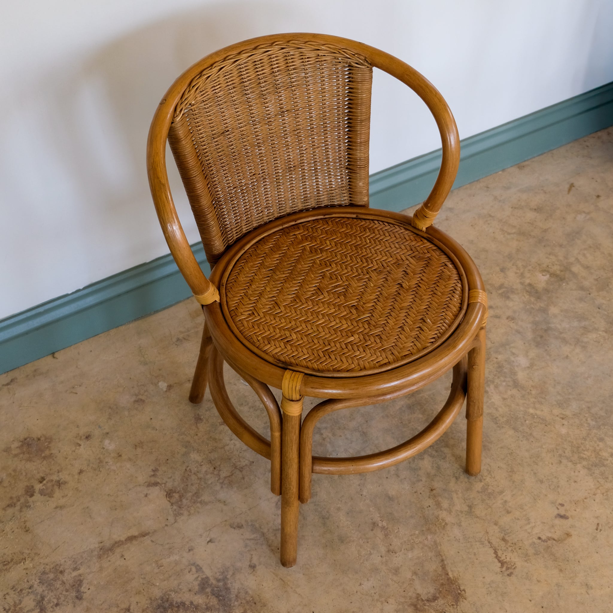 SMALL RATTAN BENTWOOD ARMCHAIR