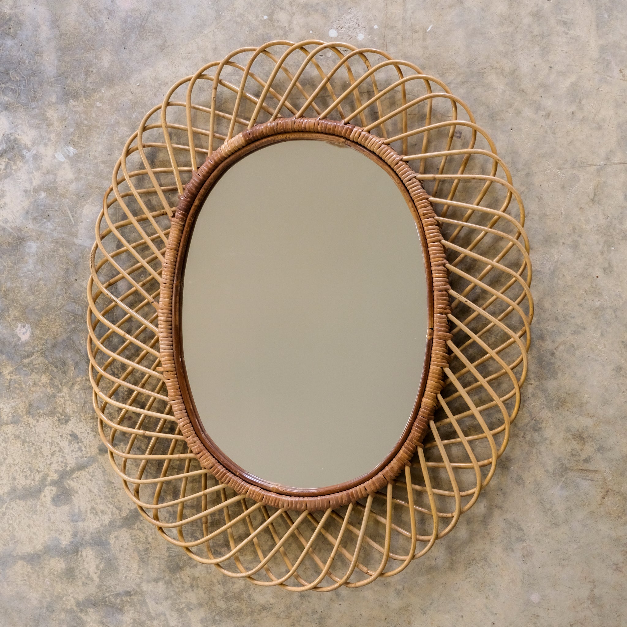 Round rattan mirror with woven frame, mid-century