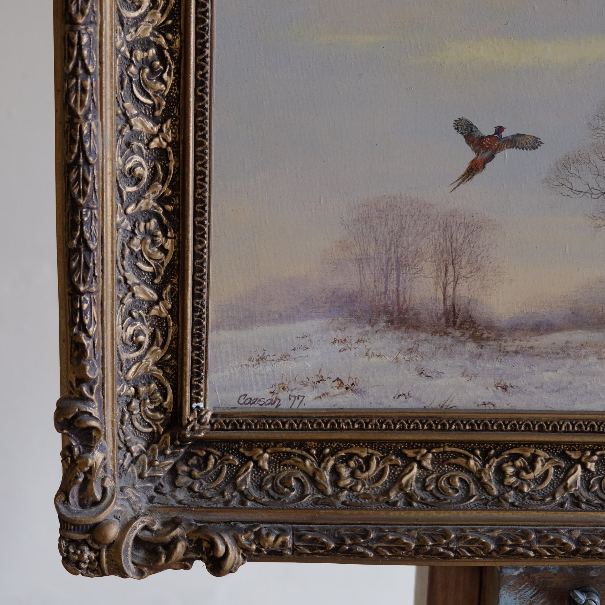 WINTER LANDSCAPE WITH A PHEASANT IN FLIGHT
