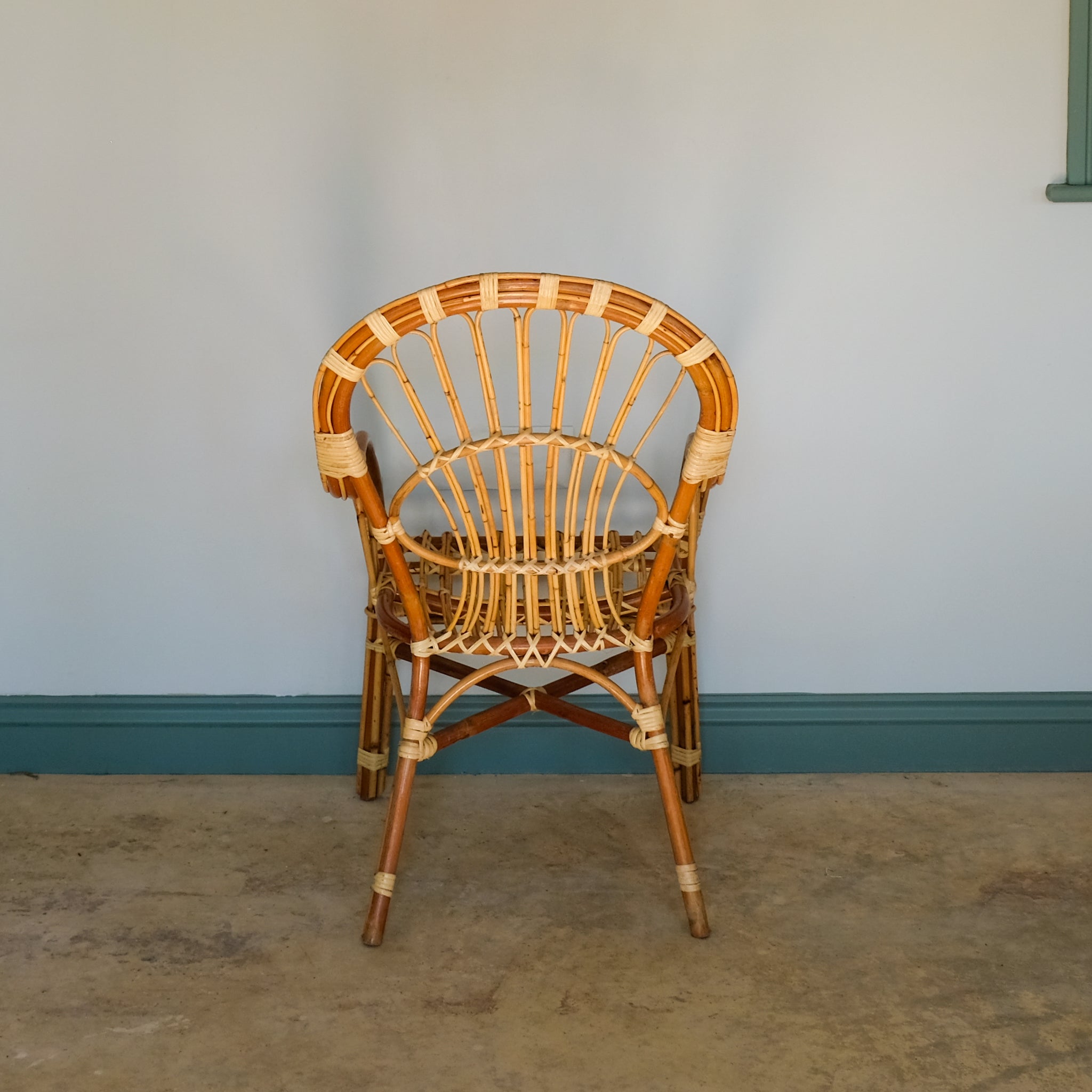 MID CENTURY RATTAN ARMCHAIR