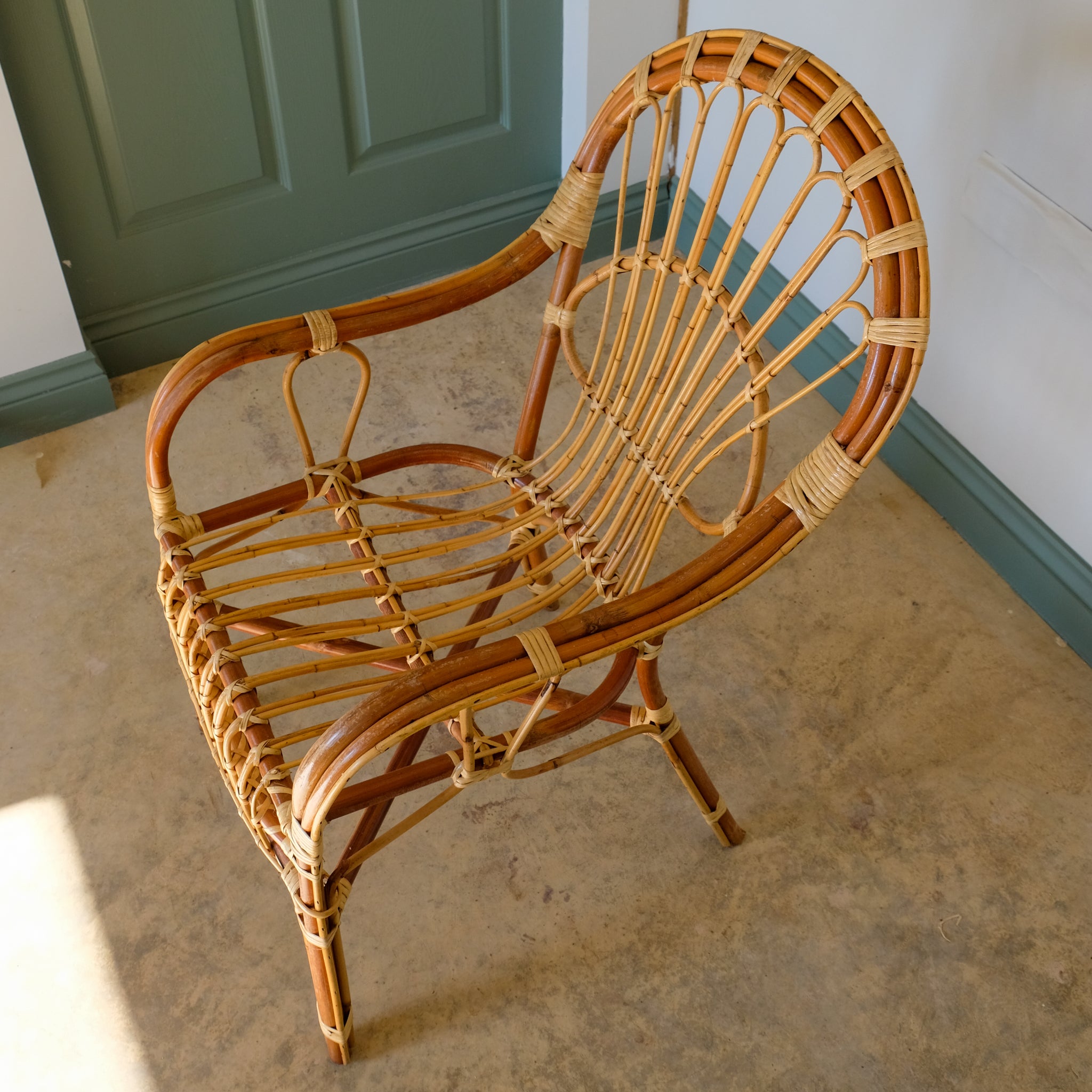 MID CENTURY RATTAN ARMCHAIR