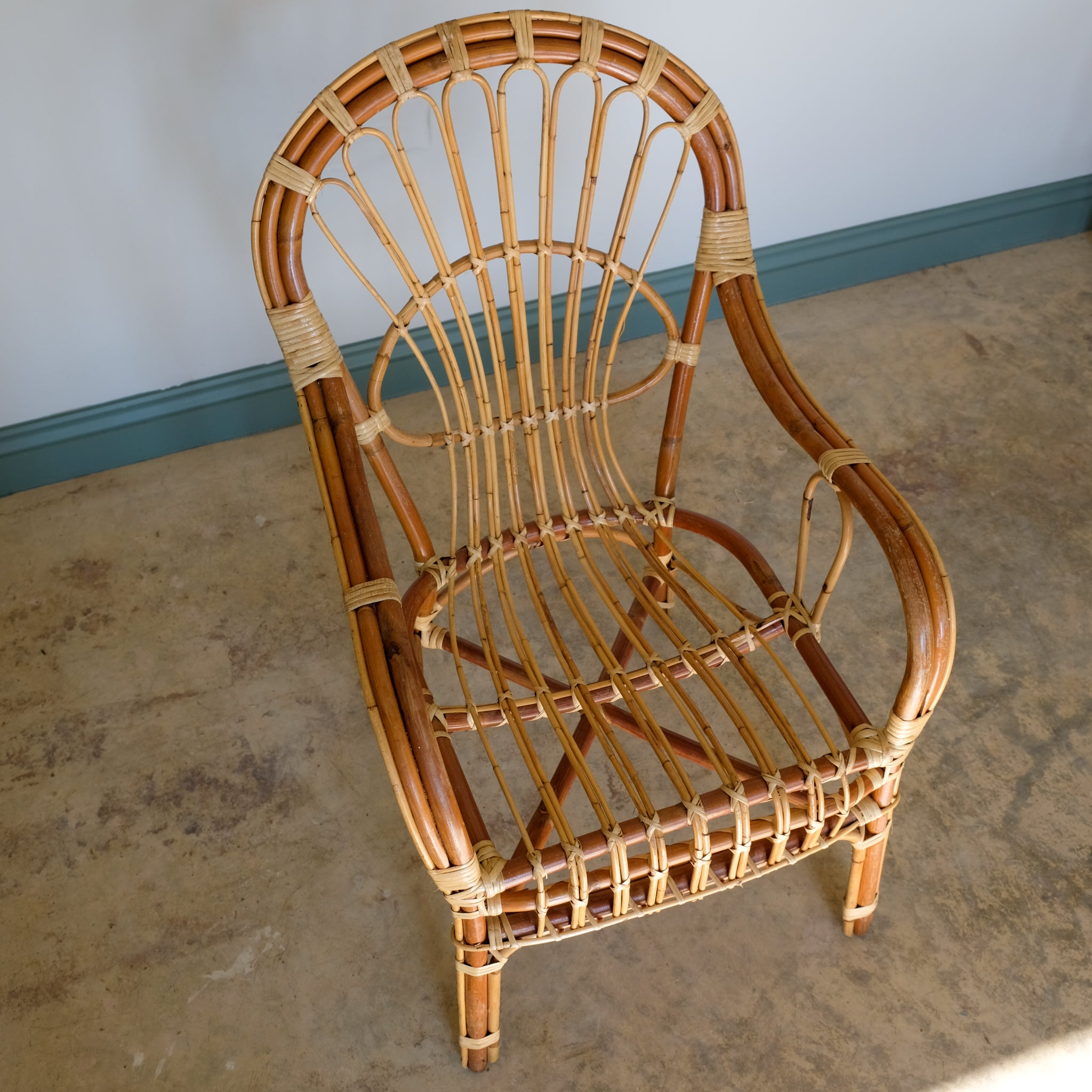 MID CENTURY RATTAN ARMCHAIR