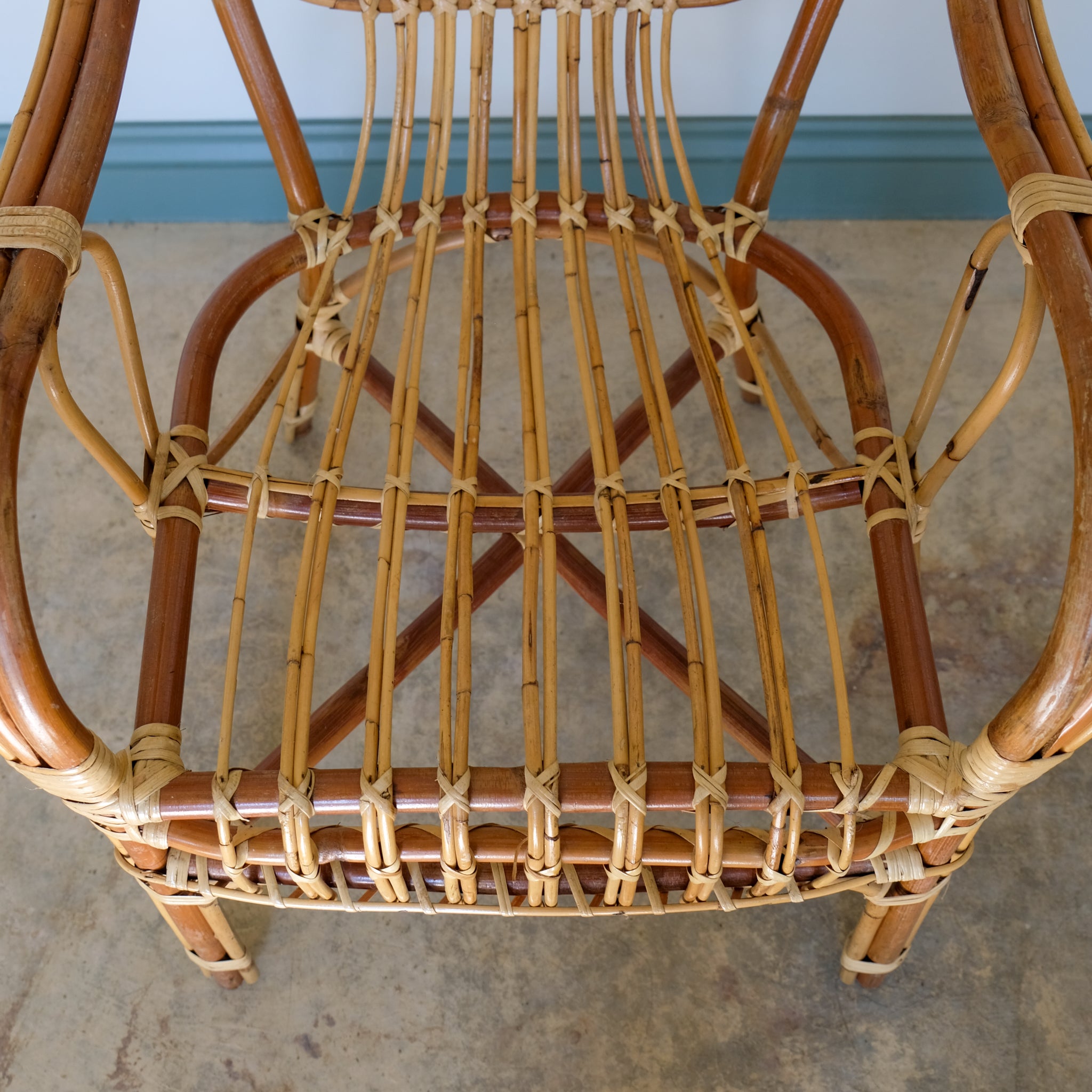 MID CENTURY RATTAN ARMCHAIR