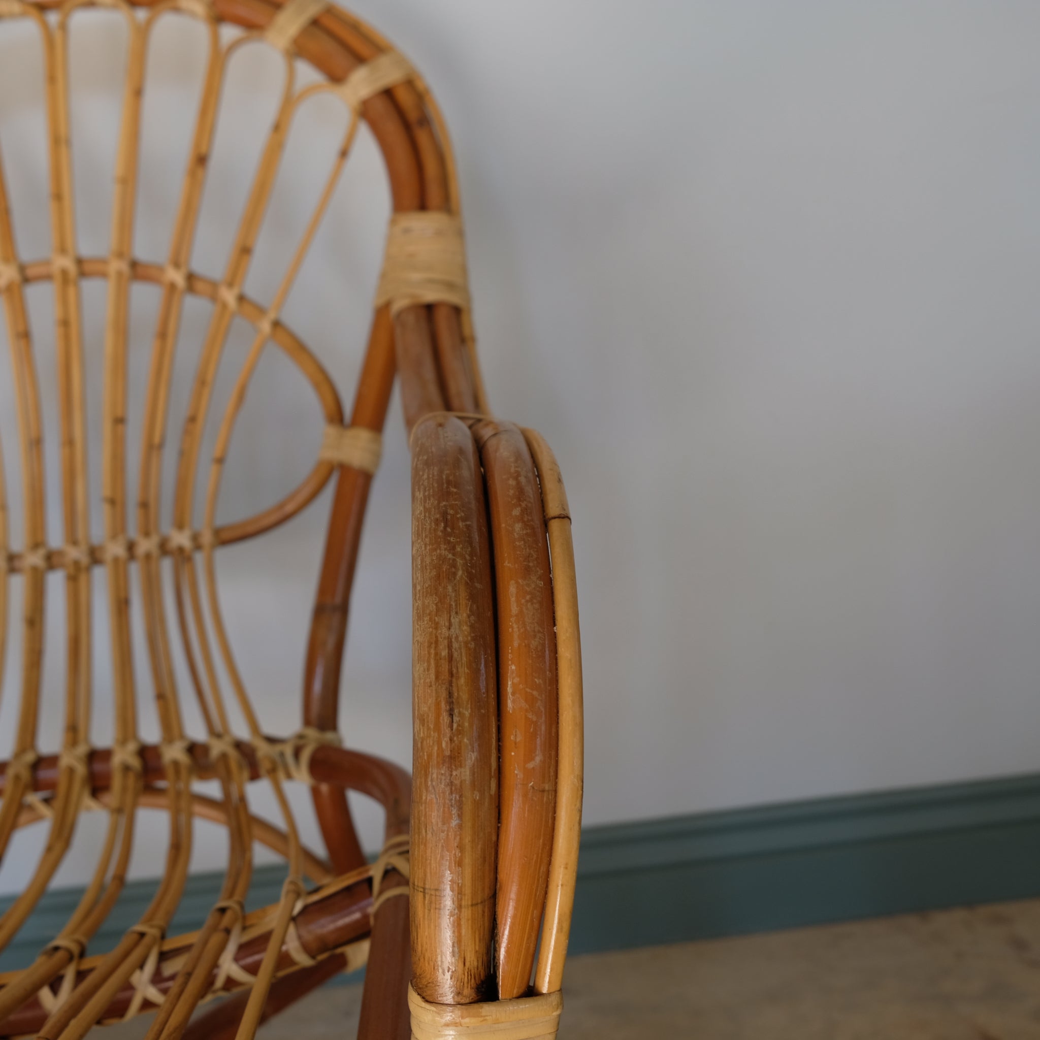 MID CENTURY RATTAN ARMCHAIR