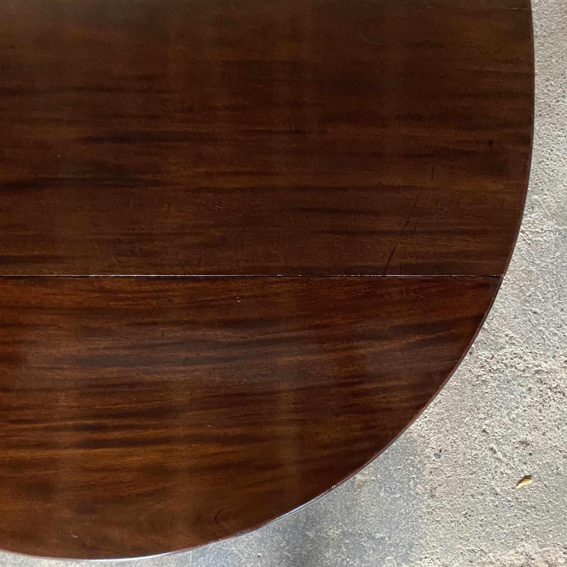 A George III mahogany oval drop leaf table, standing on elegant cabriole legs. A lovely example with a delightful patina throughout in very good condition. Perfect as a dining, side or hall table.