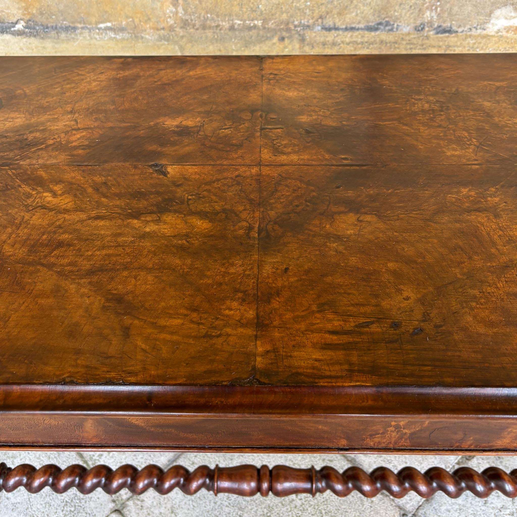 A VICTORIAN WALNUT AND ROSEWOOD LIBRARY TABLE