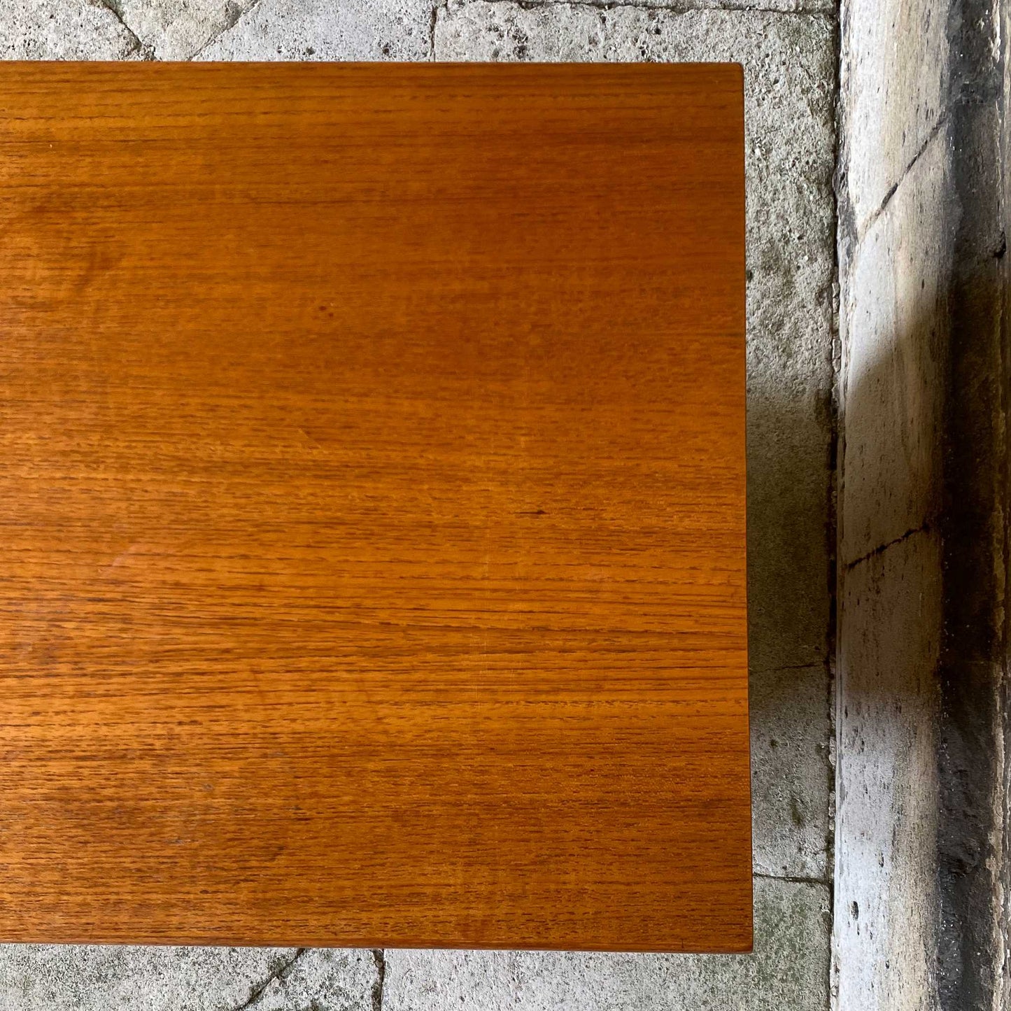 A low teak mid century sideboard by G Plan. Two spacious cabinets, each with a pair of doors and single internal shelf. The maker's mark is present inside one of the doors. In lovely condition, with some very light marks to the top, commensurate with the item's age.