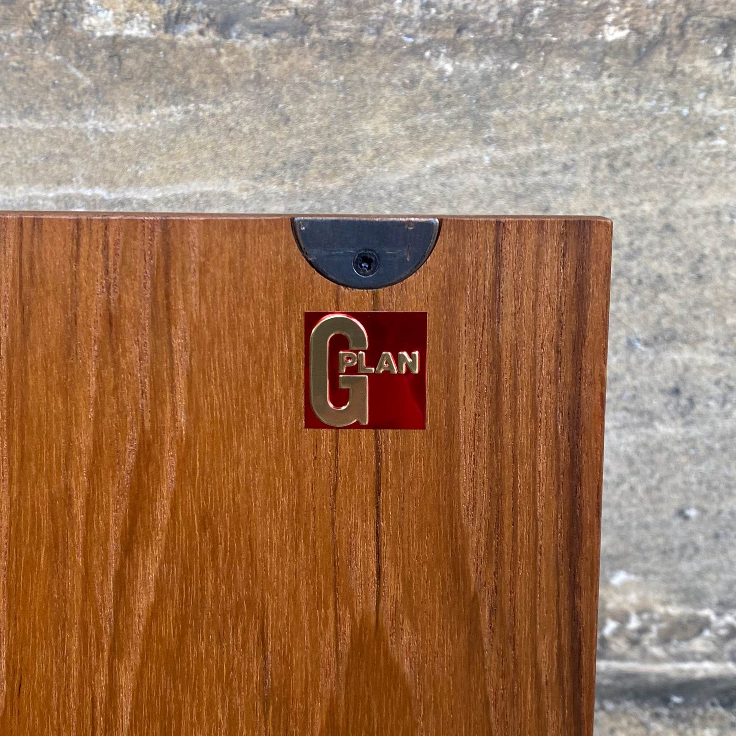 A low teak mid century sideboard by G Plan. Two spacious cabinets, each with a pair of doors and single internal shelf. The maker's mark is present inside one of the doors. In lovely condition, with some very light marks to the top, commensurate with the item's age.