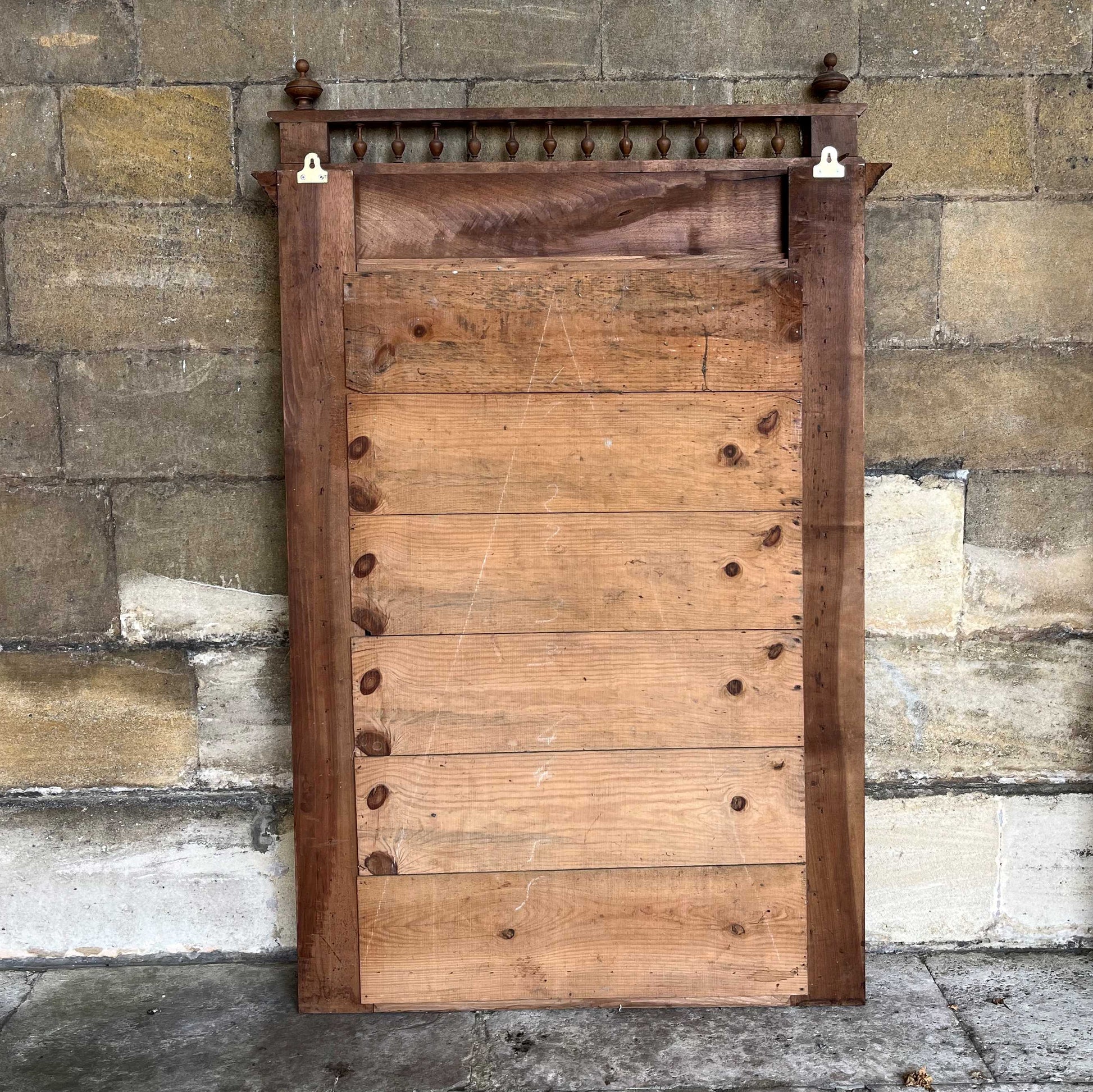 A 19th century pier mirror with original mercury plate in very good condition, some foxing giving a pleasing patina. Flanked on either side by two fluted columns, with detailed carving above.
