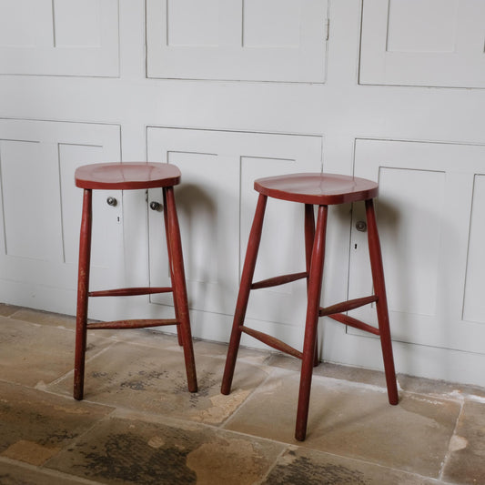 A PAIR OF PAINTED BAR STOOLS