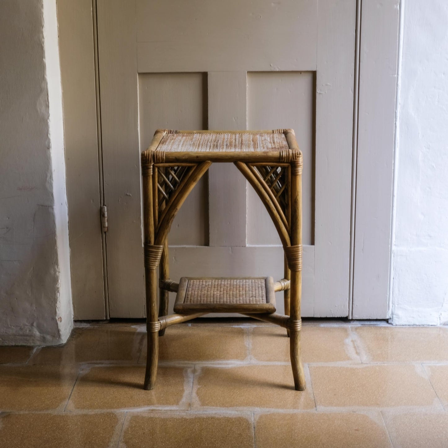 A BAMBOO AND RATTAN SIDE TABLE
