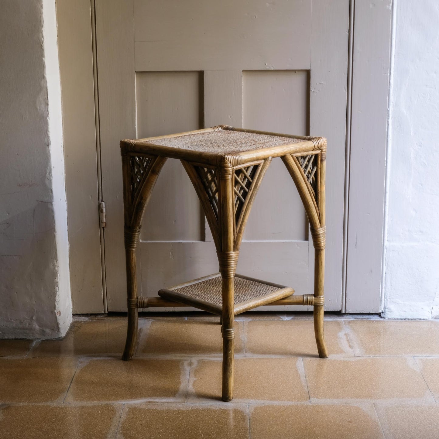 A BAMBOO AND RATTAN SIDE TABLE