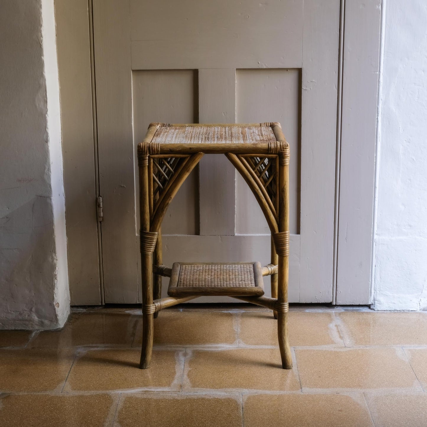 A BAMBOO AND RATTAN SIDE TABLE