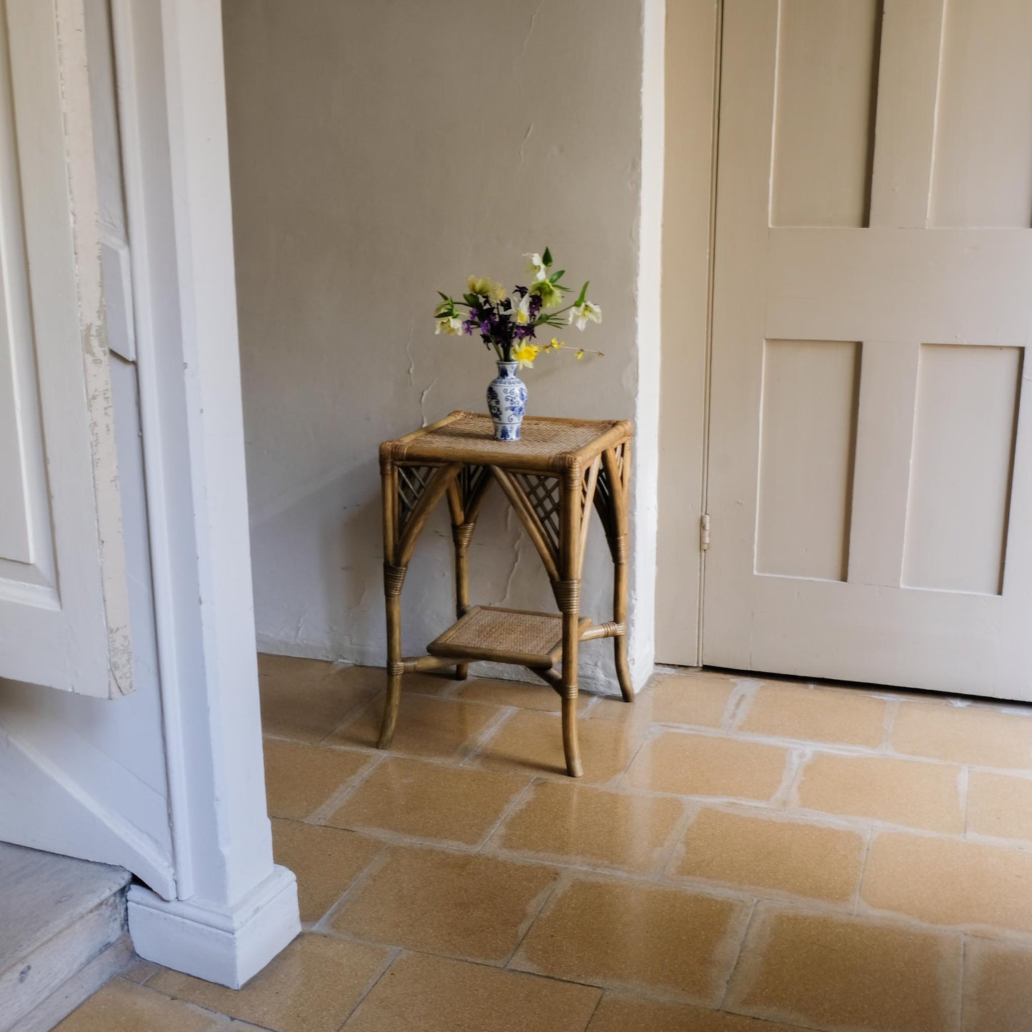 A BAMBOO AND RATTAN SIDE TABLE