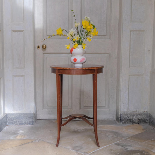A CIRCULAR EDWARDIAN LAMP TABLE
